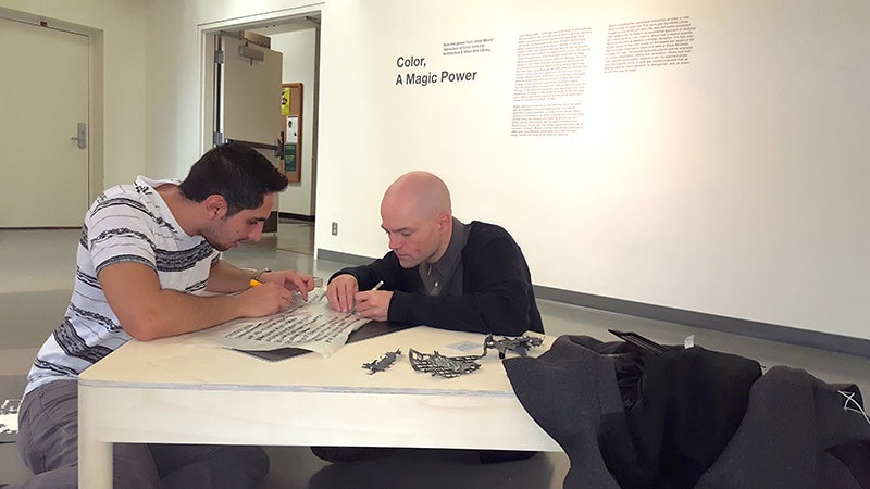 Landry Smith and José Guillermo Perez finalize text for the exhibition
