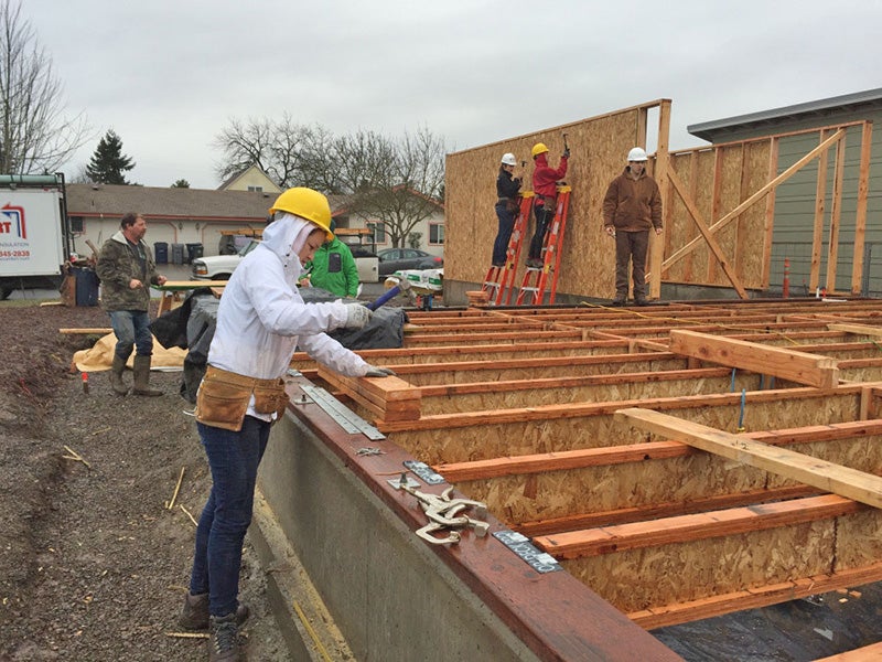 Students finish floor joists during the OregonBILDS studio