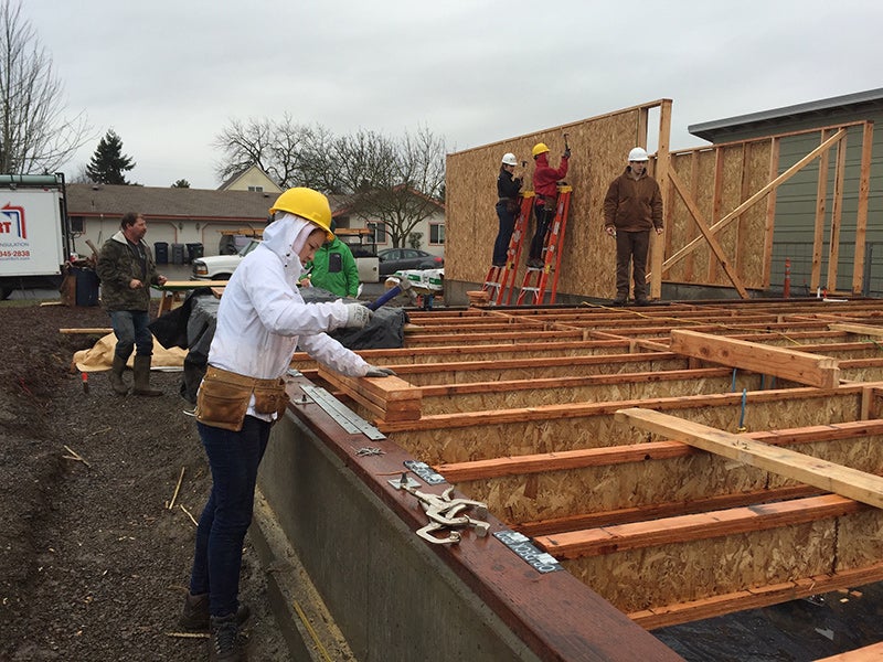OregonBILDS students build the subfloor and begin erecting walls