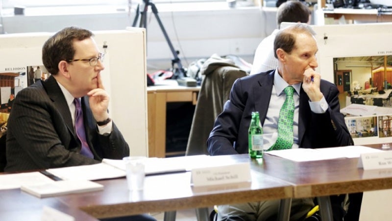 UO President Michael Schill (left) and US Senator Ron Wyden