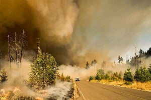 photo of wildfire smoke on a highway