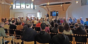 The crowd at the 2022 Reynolds Symposium celebrated the life and work of architect