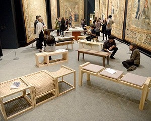 critique of student-made benches at Berberini exhibit