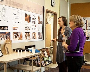 student presents work during critique