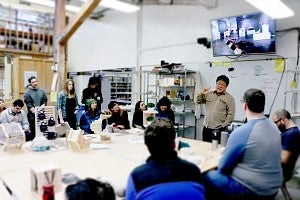 associate Professor Kyuho Ahn teaching a class