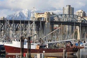 Vancouver shipyard, city, and mountains