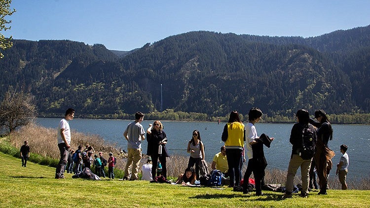 student field trip to the The Shire with Multnomah Falls in background