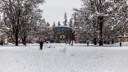 Snow days at the University of Oregon outside of the Lillis Business Center.