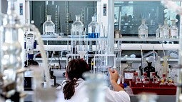 Photo of a person working in a lab