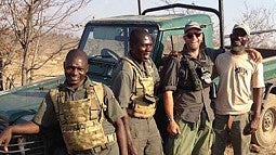 Jess Kokkeler with members of the International Anti-Poaching Federation team in Zimbabwe