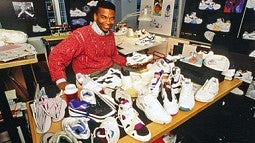 Wilson W. Smith III surrounded by shoes
