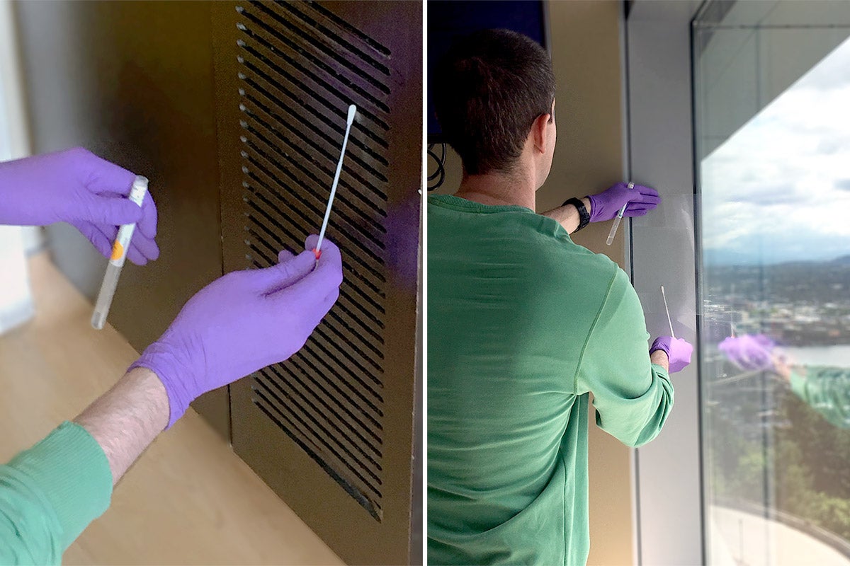 gloved hands gathering a sample on a vent with a swab