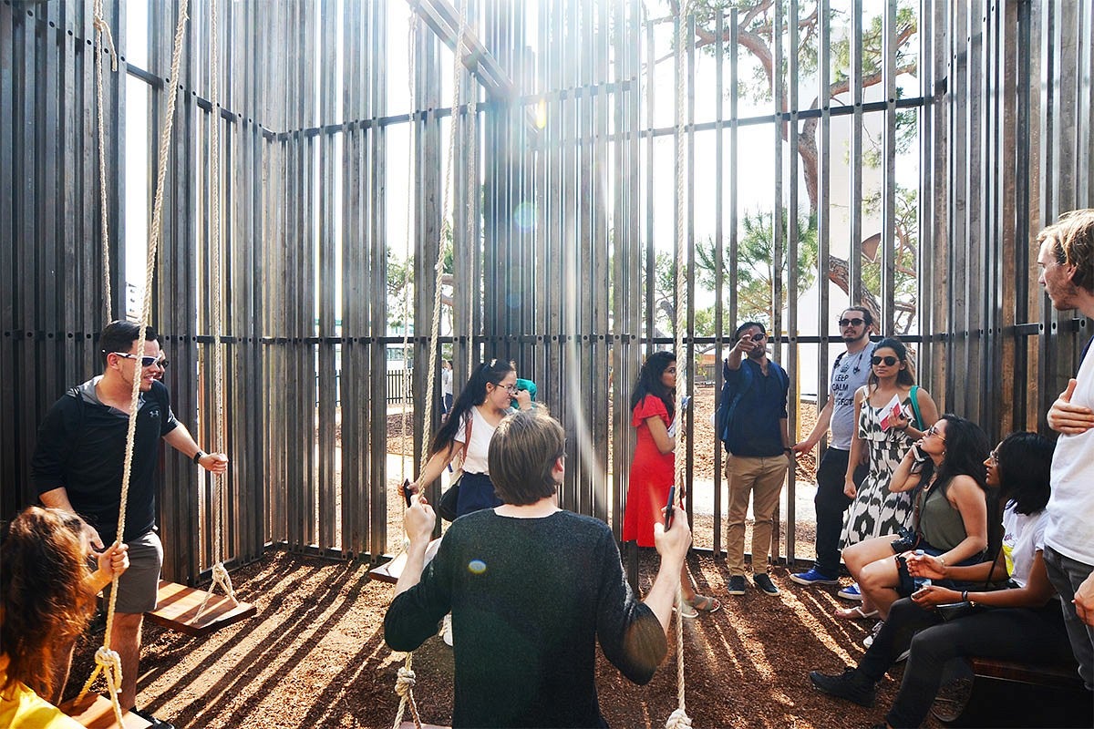 Photo of Sami Chohan with a group at the Pakistan Pavillion at the Venice Biennale