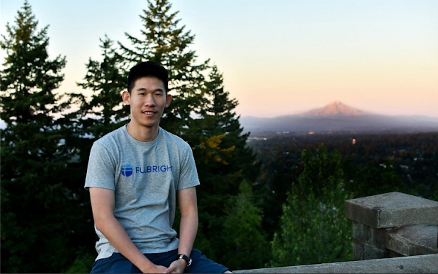 Photo of Jordan Paing in front of Portland Skyline