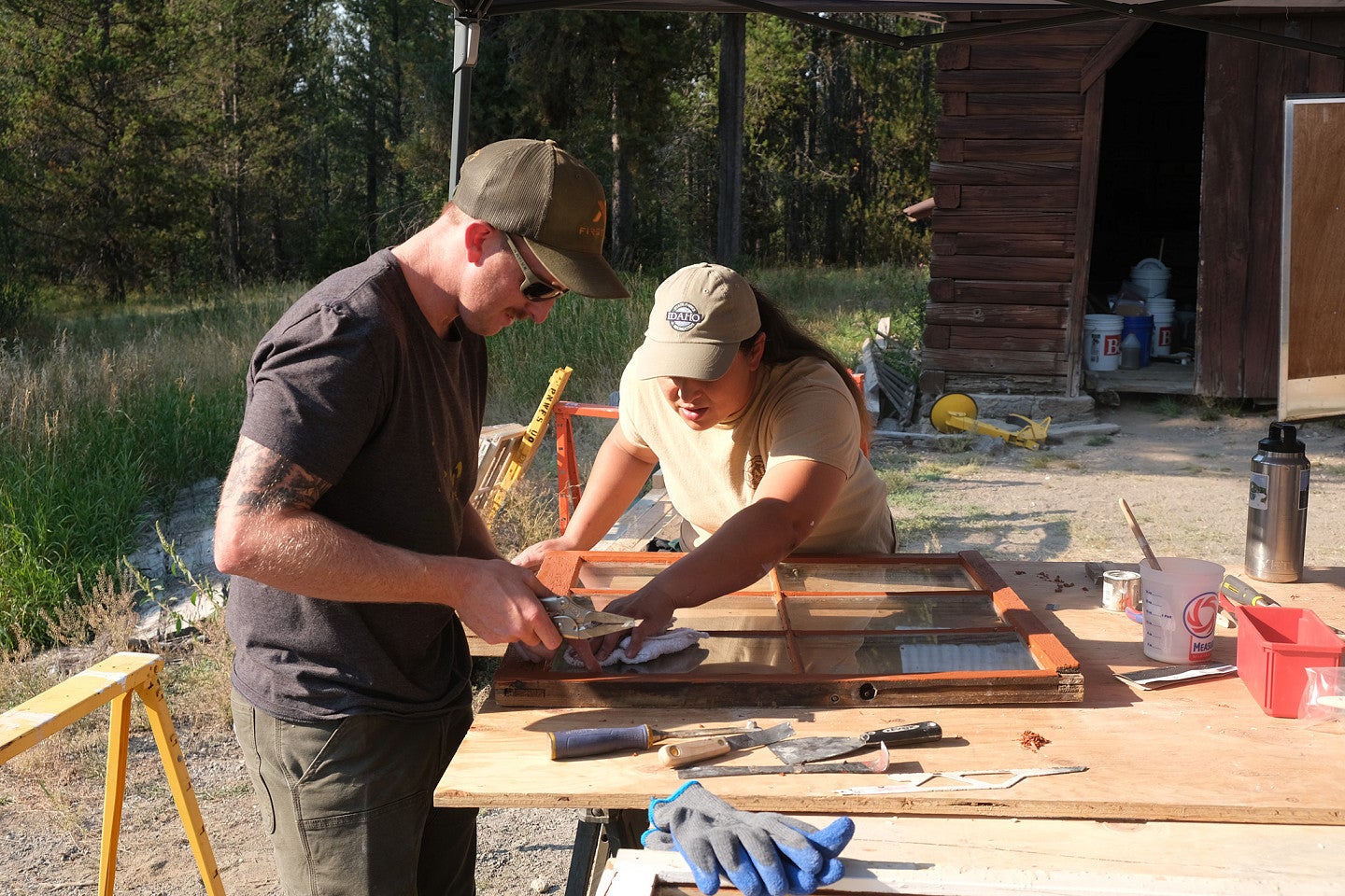 Photo from 2022 PNWPFS student working on another window frame. 
