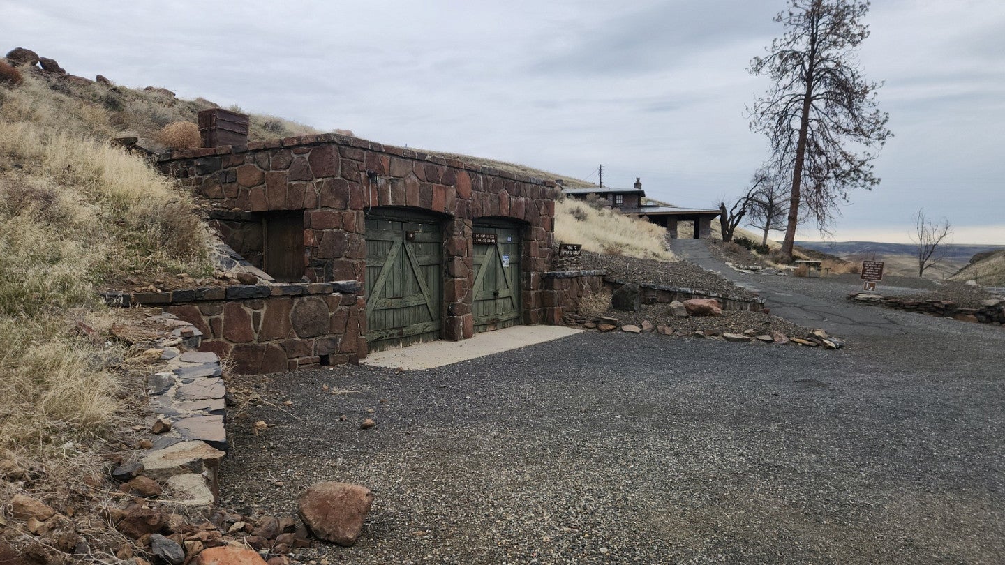 Side view of a historic garage. 