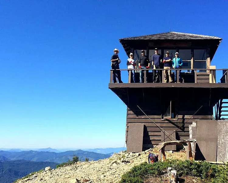 Students on a fire lookout tower