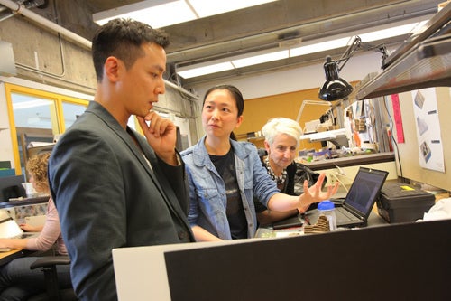Architecture student Wenyu Jiang gets feedback on her project from Daniel Wu